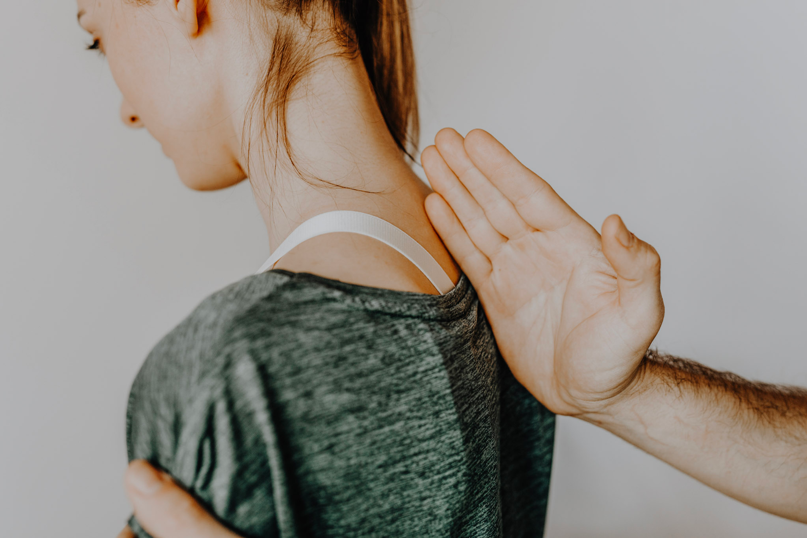 woman finding a chiropractor through getting adjustment